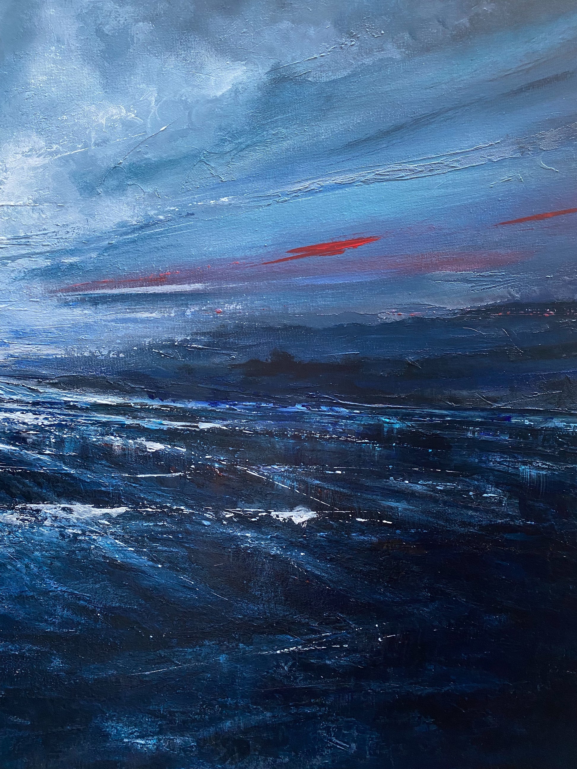 Abstract painting of a stormy sea with dark blue and gray tones.
