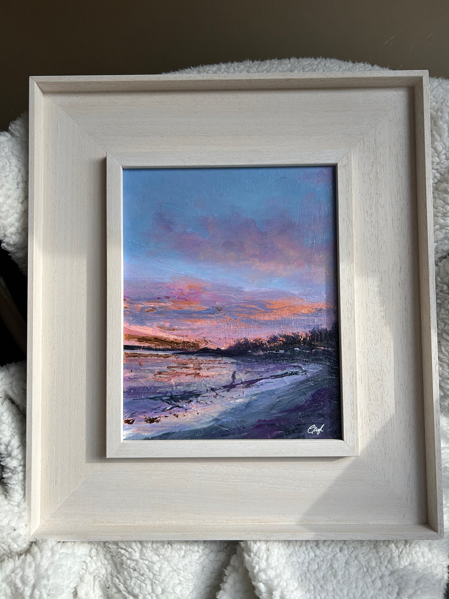 Framed artwork of a sunrise over a beach with a white frame. Helen's Bay, sea swimming